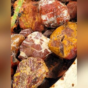 Colorful Natural Jasper Stones Showing Someone